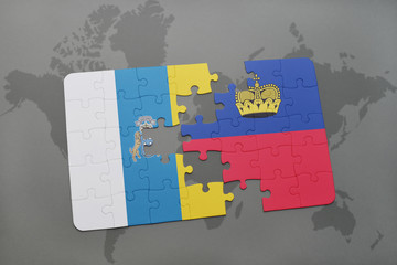 puzzle with the national flag of canary islands and liechtenstein on a world map background.