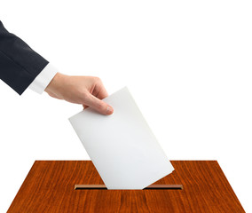 Hand with ballot and box