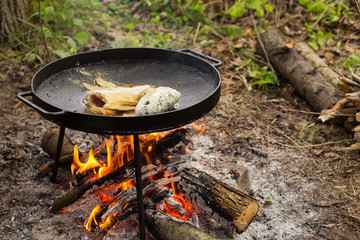 fried fish on the big pan