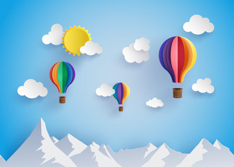  colorful hot air balloon flyin over moutain