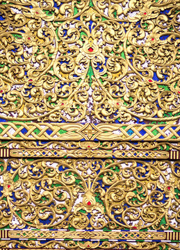 old antique gold frame Stucco walls Thai style pattern isolated
