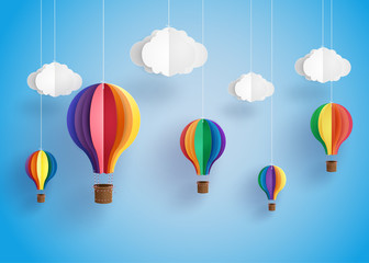 Naklejka premium kolorowy balon na gorące powietrze i chmura.