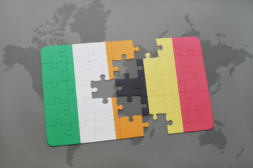 puzzle with the national flag of ireland and belgium on a world map background.