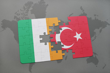 puzzle with the national flag of ireland and turkey on a world map background.