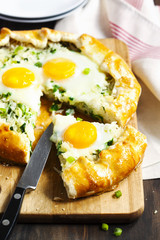 Pie with rice, green onions and egg. Galette