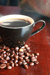 Hot Coffee Cup With Coffee Beans