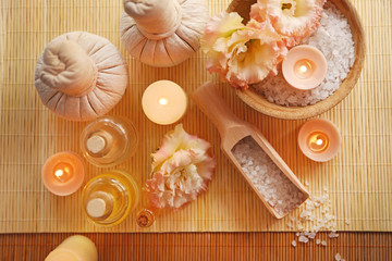 Beautiful spa composition with flowers on wooden background