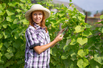 woman with a cucumber