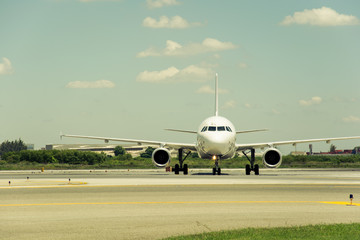 Fototapeta na wymiar Airplane ready to take off from runway