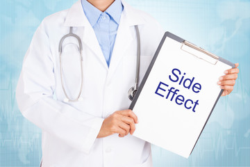 Doctor holding clipboard with side effect text on a sheet of paper on white background