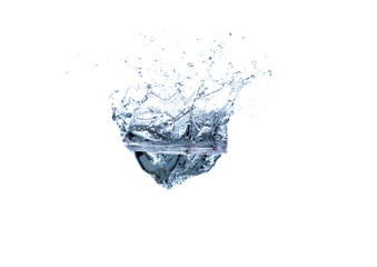 Fototapeta na wymiar Ice Cube Dropping in Healthy Water. Splashes