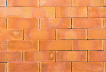 Surface of red regular brick wall texture