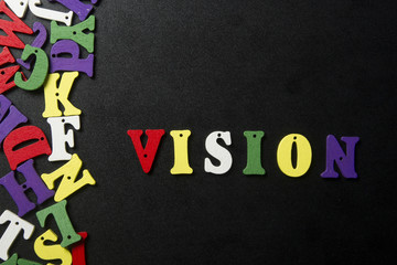 Obraz premium word vision on colorful wooden abc letter