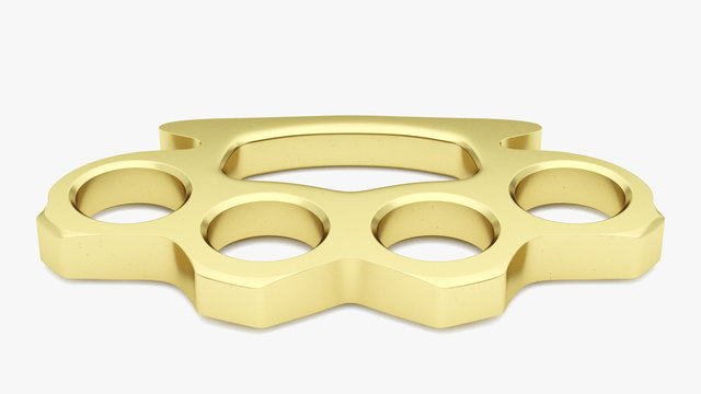 Gold Knuckle Duster in a high key studio environment. Version 2 of 2.