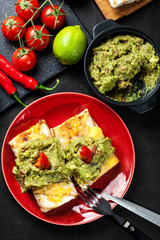 Mexican chimichanga with guacamole dip