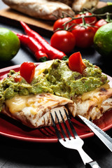 Mexican chimichanga with guacamole dip