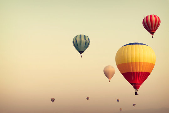Hot air balloon on sky with fog, vintage and retro instagram filter effect style