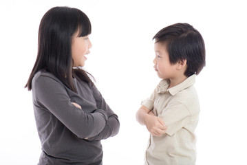Asian sister and brother quarreling