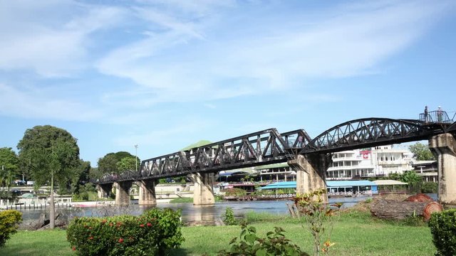 Railway Bridge over the River Kwai at Kanchanaburi,Thailand, Time lapse 4K, low-angle view of shot