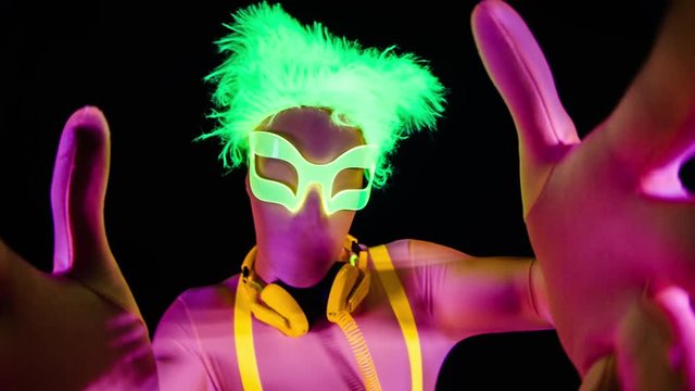 cyber raver man in fluorescent UV glow