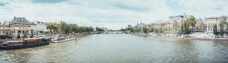 View of boats and buildings from wide canal