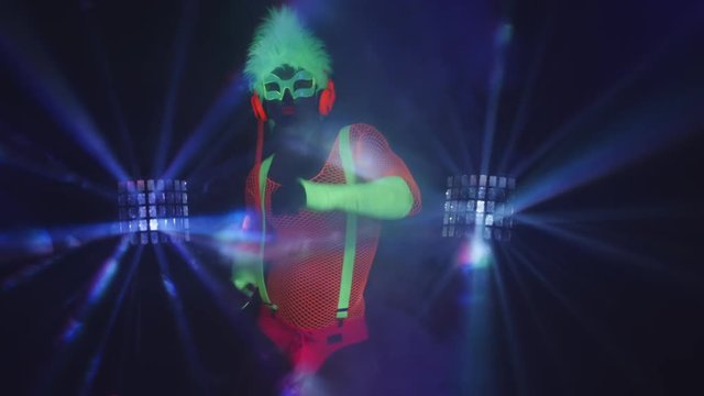 cyber raver man in fluorescent UV glow