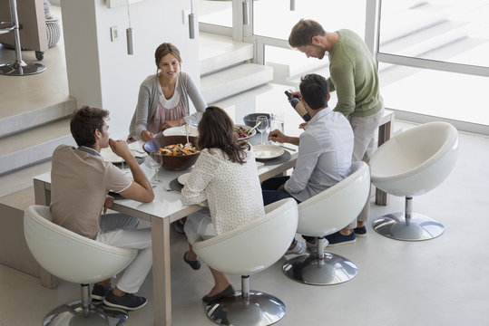 People sitting at dining table