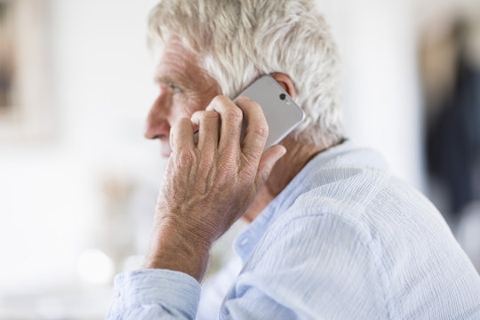 Senior Man Talking On Phone