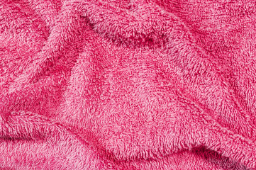 Fototapeta na wymiar Closeup surface fabric pattern at old and wrinkled red fabric towel texture background