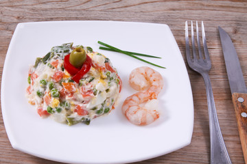 vegetable salad and seafood in a bowl