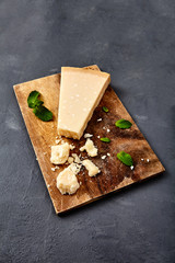 Piece of a parmesan and grated cheese