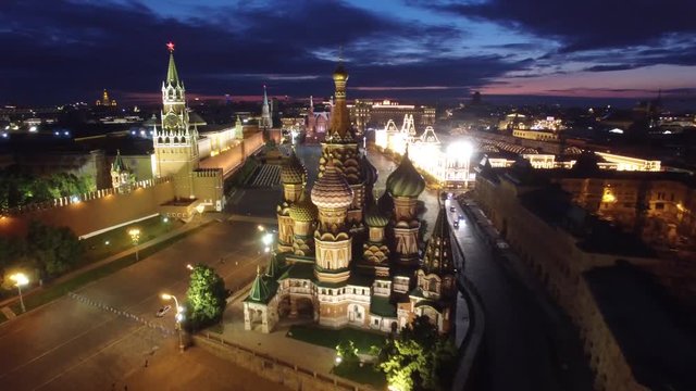Saint Basil's Cathedral flight around. Best unique night flight close to Moscow Kremlin and Red Square. Evening embankment road traffic. City illumination. 4k footage. Aerial drone quadcopter.