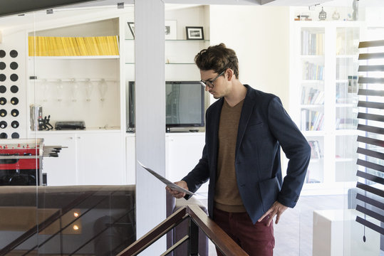 Businessman reading brochure