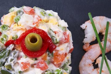 vegetable salad and seafood in a bowl