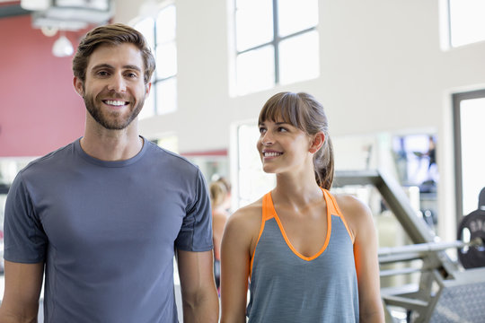 Close-up Of A Young Couple Smiling In A Fitness Club