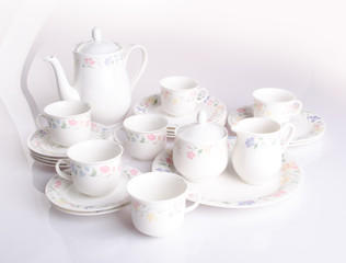 teapot and cup set . teapot and cup set on a background