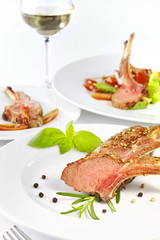 Roasted lamb rib chops, dinner setting.