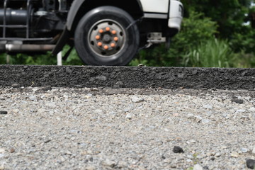 Cross section of asphalt road (top layer is an asphalt and bottom layer is an crushed rock )
