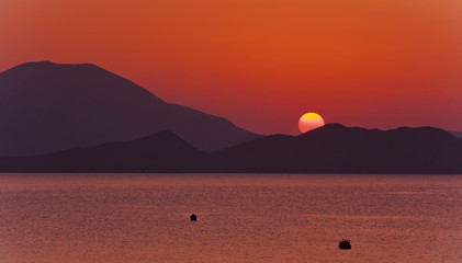 Fototapeta premium The sun rises over the mountains and the sea Bay.Crimea.