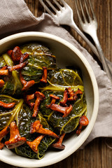 Cabbage rolls,  savoy cabbage stuffed with rice and chanterelle mushrooms, top view