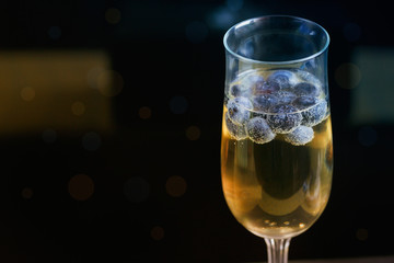 Glasses of champagne with blueberries