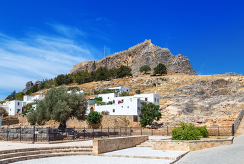 Fototapeta premium Antique amphitheater and medieval fortifications in Lindos