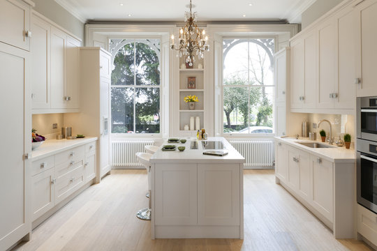 Kitchen with double sash windows and tall ceilings. 