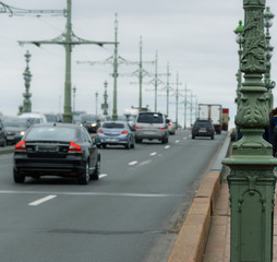 Fototapeta na wymiar cars in blur on bridge at cloudy day