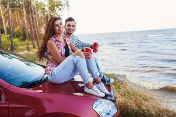 affectionate young couple on a road trip