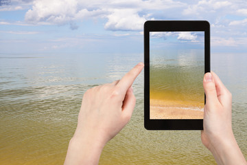 calm surface of Azov Sea on tablet pc