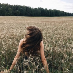 Boho girl in nature, enjoing summer