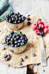 fresh blueberries, currants and raspberries,selective focus, rus