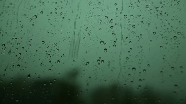 Rain drops closeup on window.