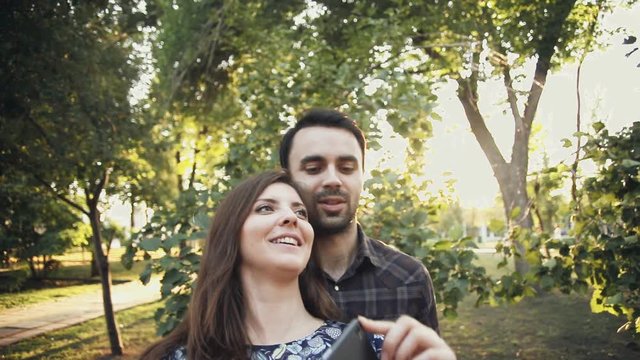 love couple is take selfie in park